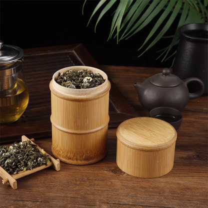 boite a the en bois ouvert remplit service thé à coté sur table bois