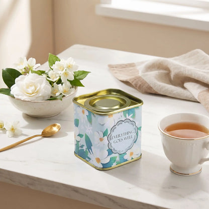 boites a thes sur table tasse thé fleur et serviette en décor