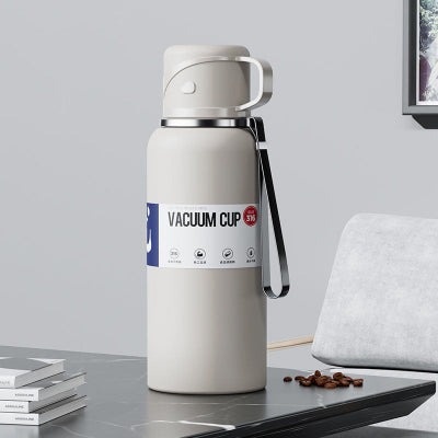 bouteille isotherme 1l blanche sur table