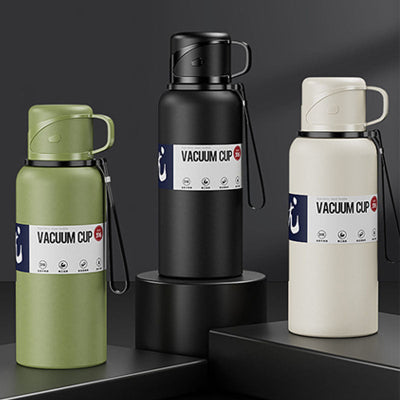 bouteille isotherme 1l verte noire et blanche sur stand