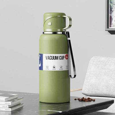 bouteille isotherme 1l verte sur table