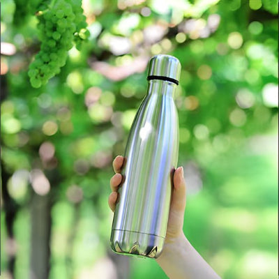 bouteille isotherme inox  utilise au parc
