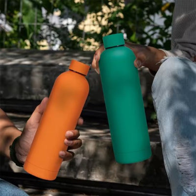  bouteille isotherme verte orange utilisé par deux personne