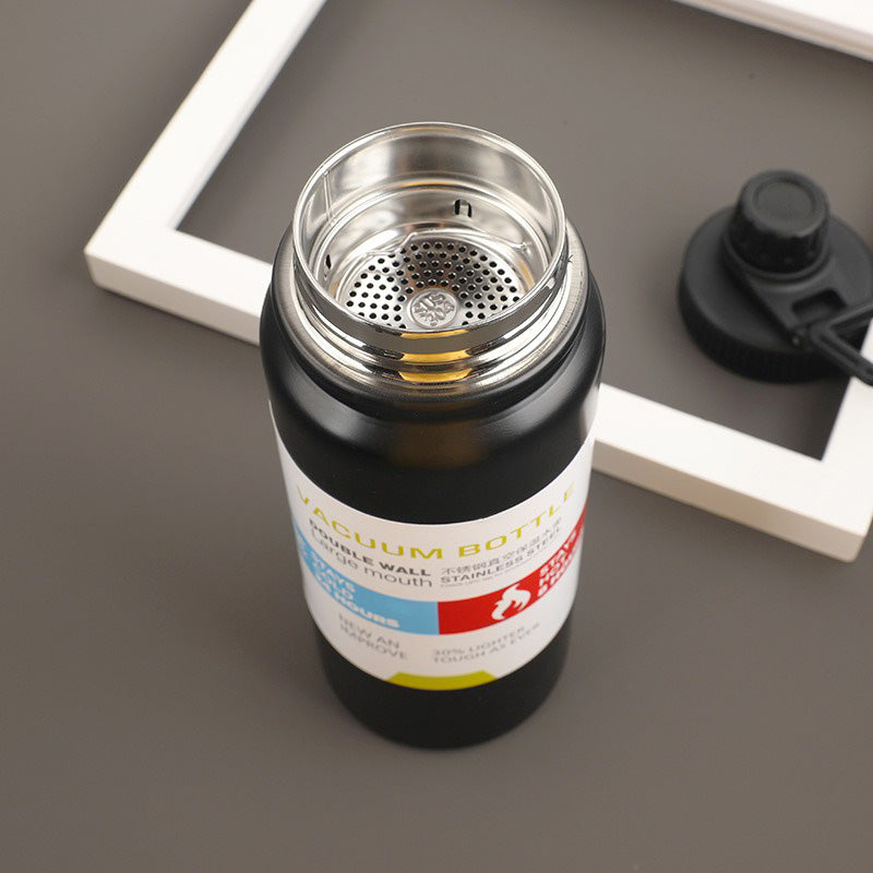 gourde isotherme 1l noire ouverte cadre blanche à coté