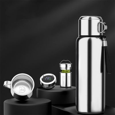 gourde isotherme inox grise intelligente infuseur et couvercle sur stand