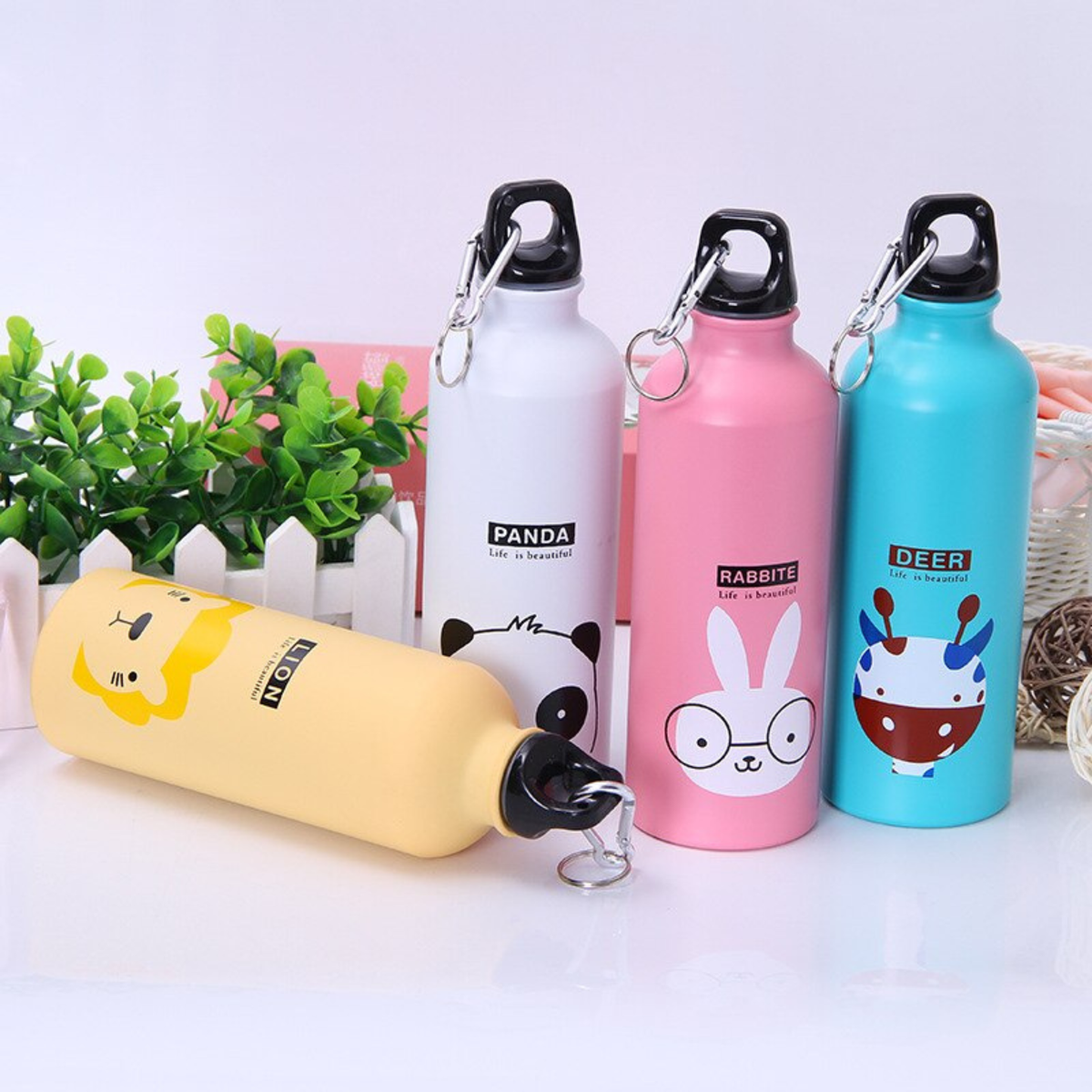 isotherme bouteille panda lion lapin cerf sur table