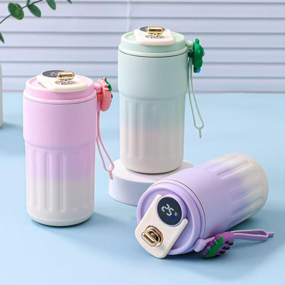 mug isotherme mauve vert et rose sur stand